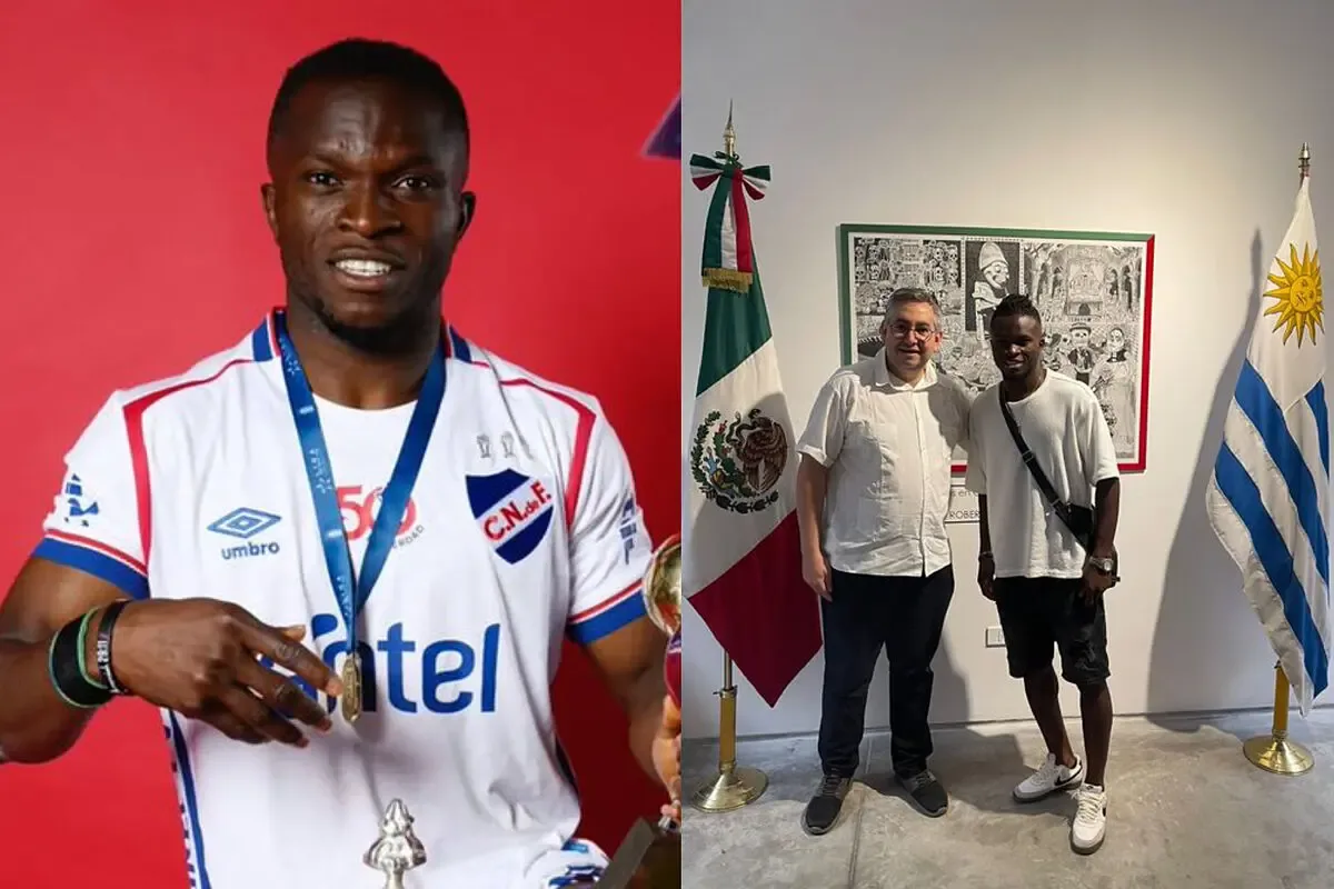 Christian Ebere durante su firma de contrato en la Embajada de México en Uruguay.