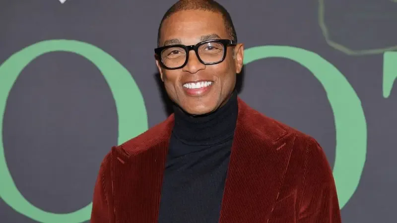 Don Lemon y Georgia Fort durante la cobertura de la protesta en Minnesota.
